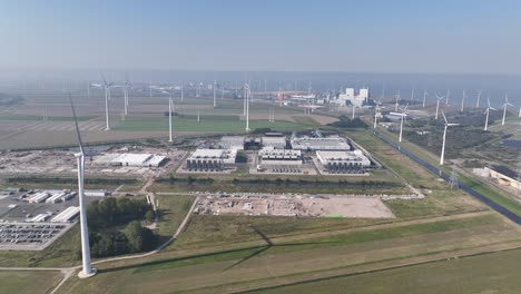 Aerial View of a Wind Farm and Power Plant