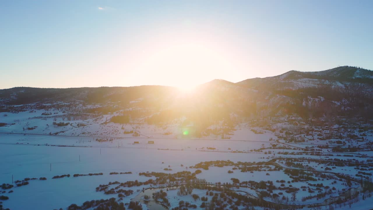 Sunrise Over Mount Werner At Steamboat Ski Resort In Steamboat Springs, Colorado. - Aerial Drone Shot