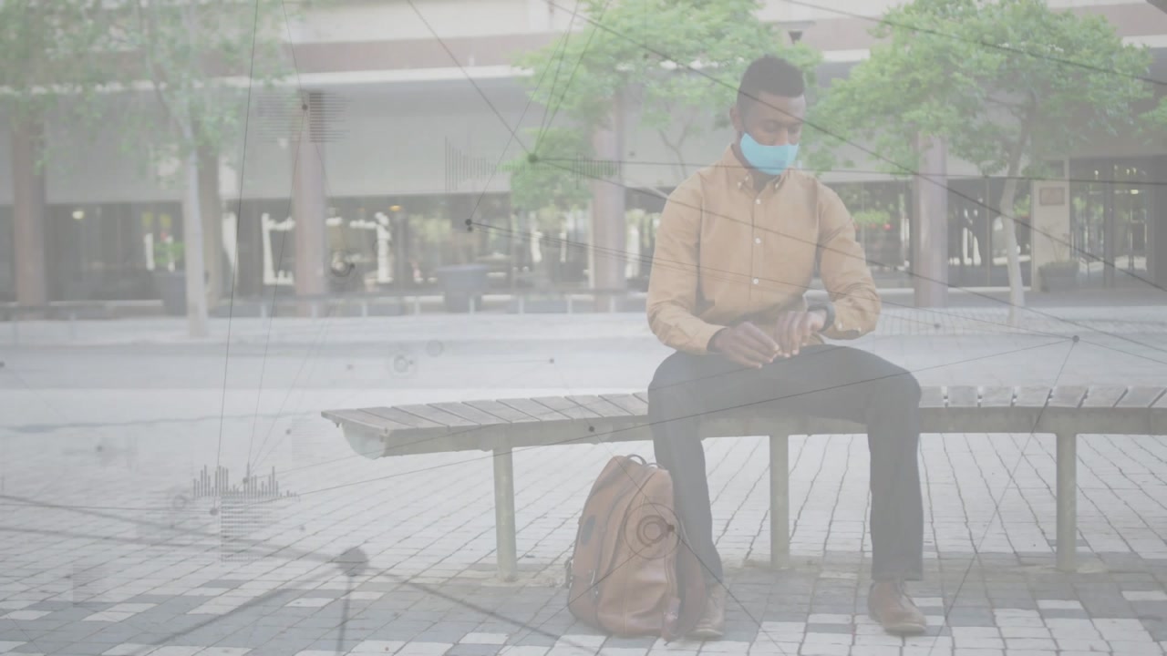 Vertical video: Man sitting plaza after ping, moving bag, checking time, tech overlay marking wrist