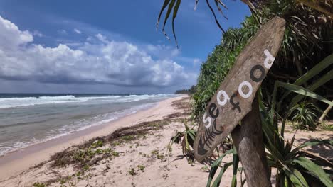 seafood restaurant abandoned sign, local business closed down off season sri lanka beach
