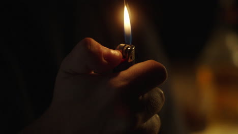 hand holding a lighter