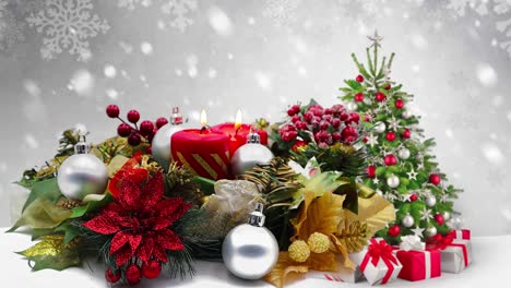 christmas decorations with red candles and christmas tree