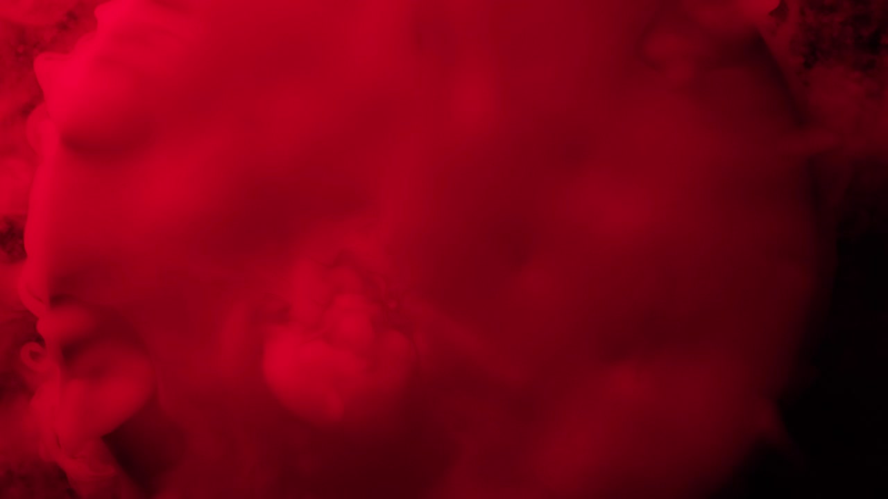 Texture di fumo colorato in primo piano. Vista dall'alto