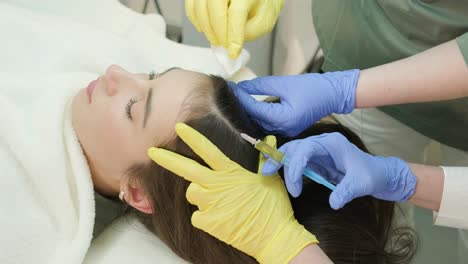 plasma therapy of the scalp. hair mesotherapy procedure in the modern cosmetology clinic