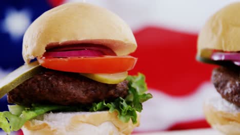 hamburgers on wooden board with 4th july theme