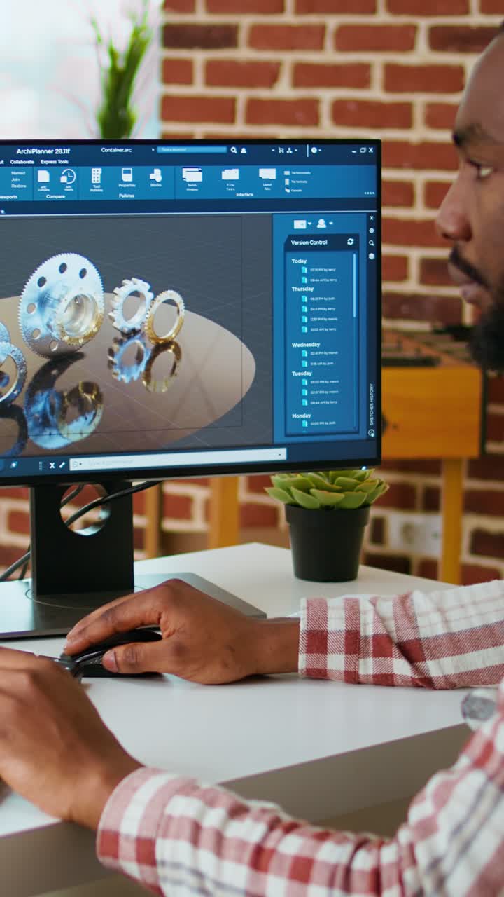 Vertical Video African american designer uses 3D modeling tools and CAD software