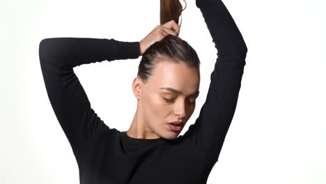 pretty seriously model female. portrait of seriously model woman posing on white background