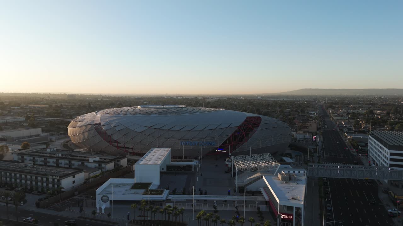 Intuit Dome pullback aerial shot during sunrise