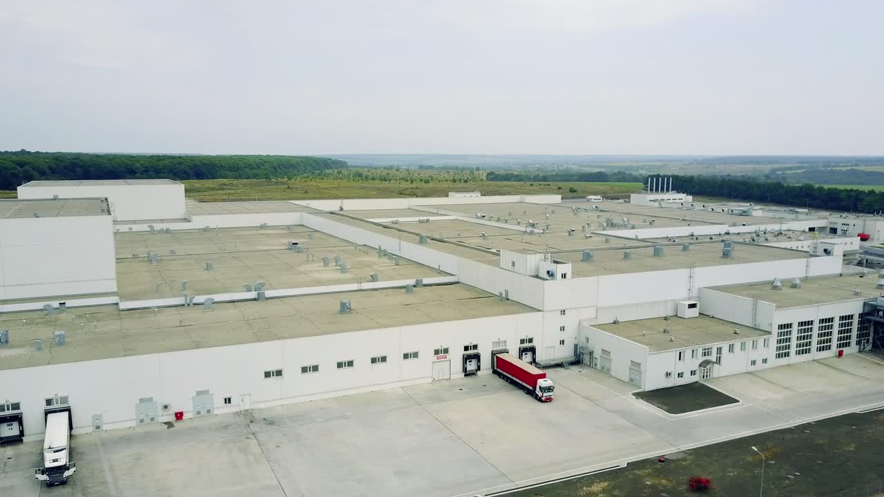 Industrial Factory Building. Aerial view of modern industrial exterior in countryside