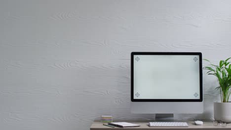 video of computer on wooden table with copy space in office