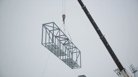 crane lifting metal structure