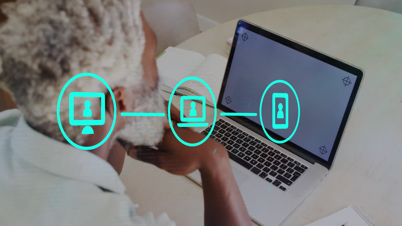 Animation of data processing over african american man using laptop