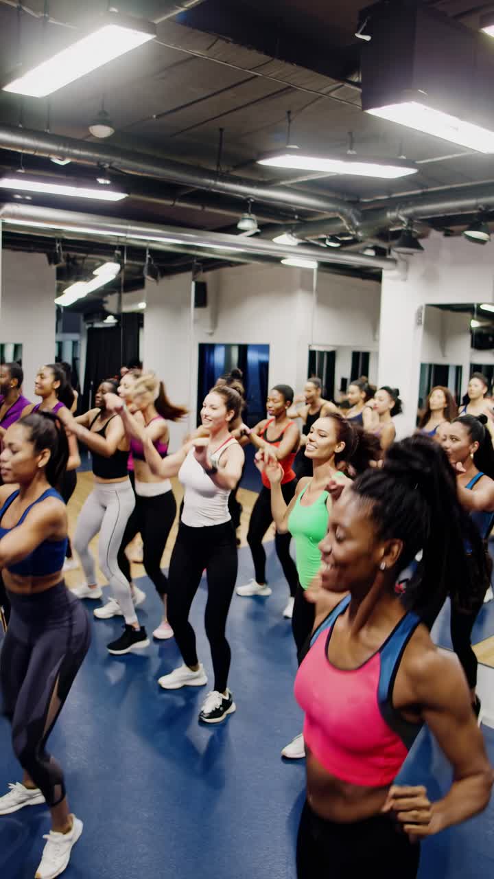 High-angle video shot of a lively dance fitness class