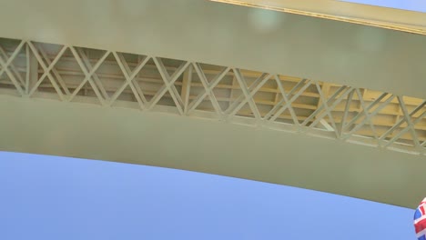 view under the infante dom henrique bridge on a sunny day in greater porto, portugal