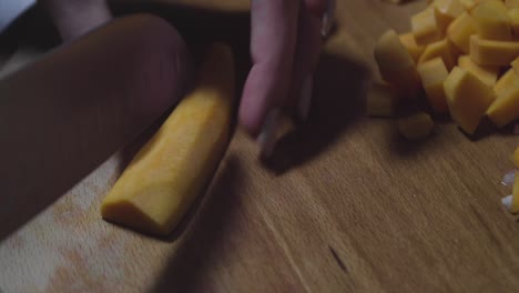 women's hands wash, peel and cut vegetables into vegetable stew