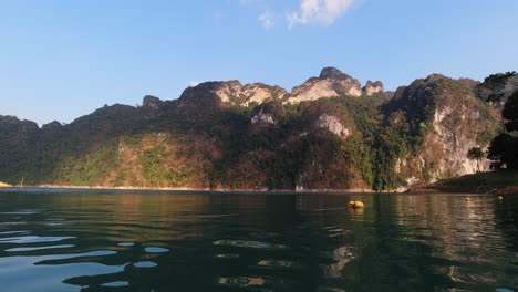 mountains of khao sok seen from water