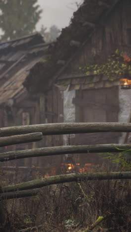 an old, wooden house in the fog