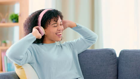 young carefree woman listening to music