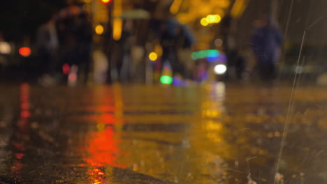 rain pouring in night city