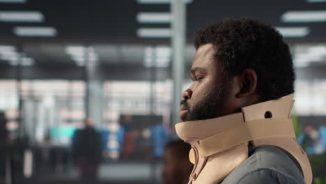 man wearing a neck brace