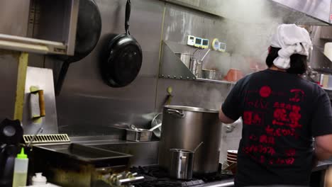 chef preparing food in a commercial kitchen