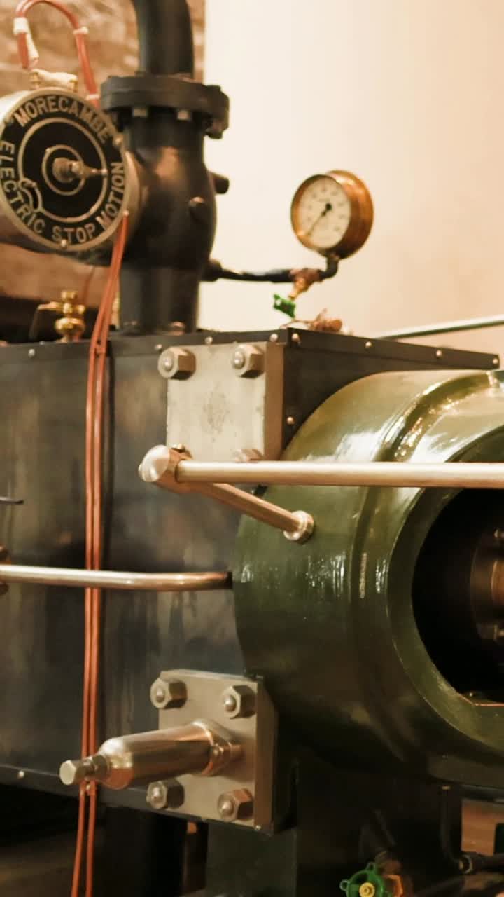 Steam engine in motion at museum exhibit