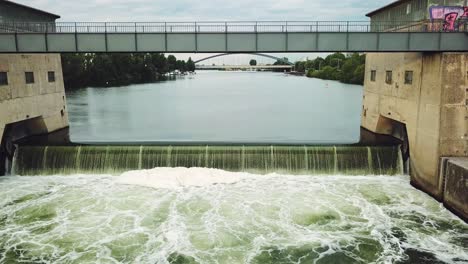 flying closly towards a floodgate in frankfurt am main, germany