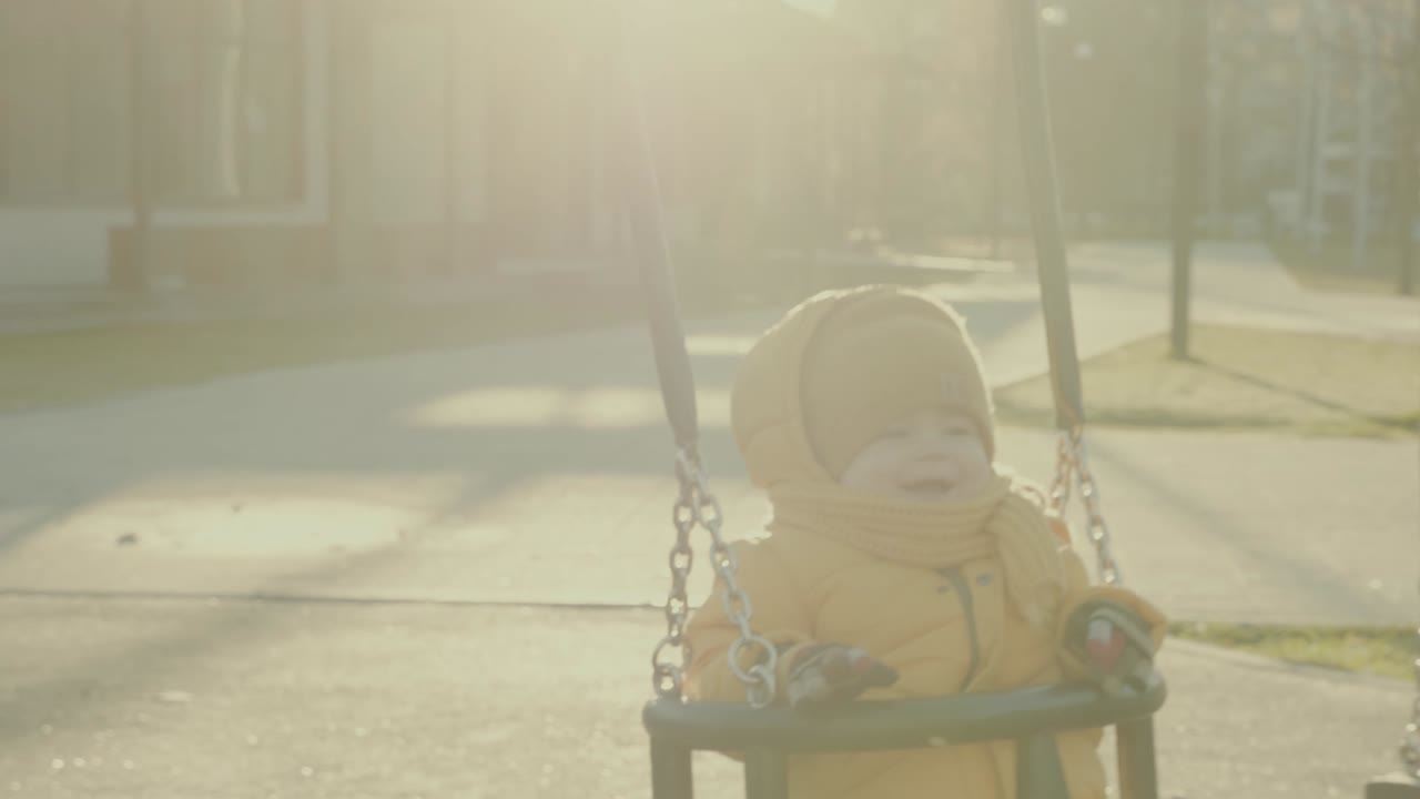 Child on a Swing in the Park