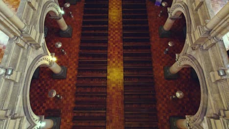 Aerial-Drone-Interior-Fly-Through-Old-Church-With-Arches-And-Pews,-4K-Santiago-Chile