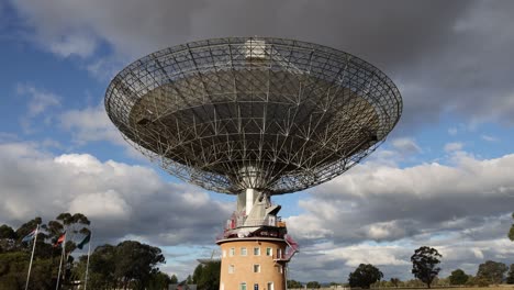 time-lapse of a large radio telescope rotating