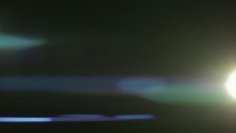 real anamorphic flares and light transition on black background