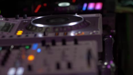 close up of dj deck lights flashing
