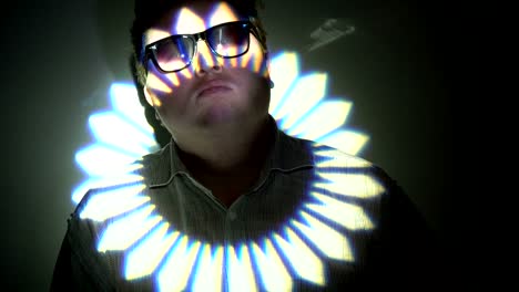 portrait of a fat man in the multicolored spotlight