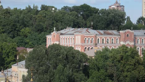 Historic-Building-With-Lush-Green-Trees-At-Daytime-In-Kyiv-City,-Ukraine