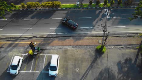 Wonderful-Denpasar-city-drone-footage-with-houses,-roads-and-cars-in-Bali