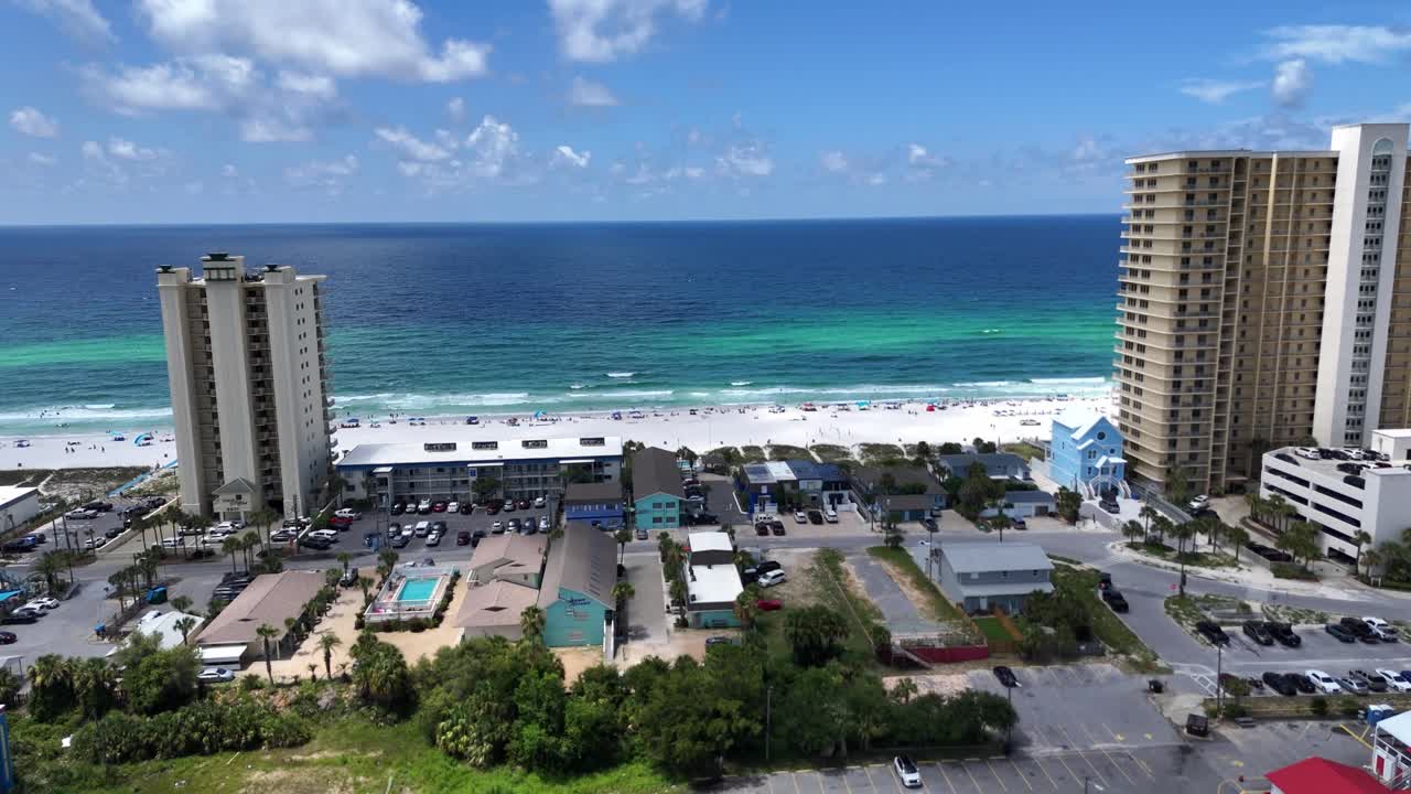 Coastal neighborhood with high-rise buildings and nearby oceanfront resort area, Panama City Beach, Florida, USA