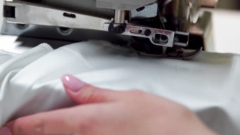 close up on a sewing machine showing process