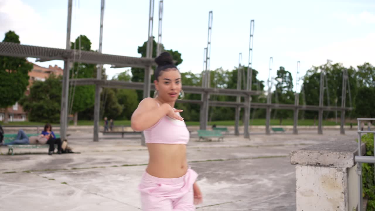 Woman Dancing Outdoors in a Park