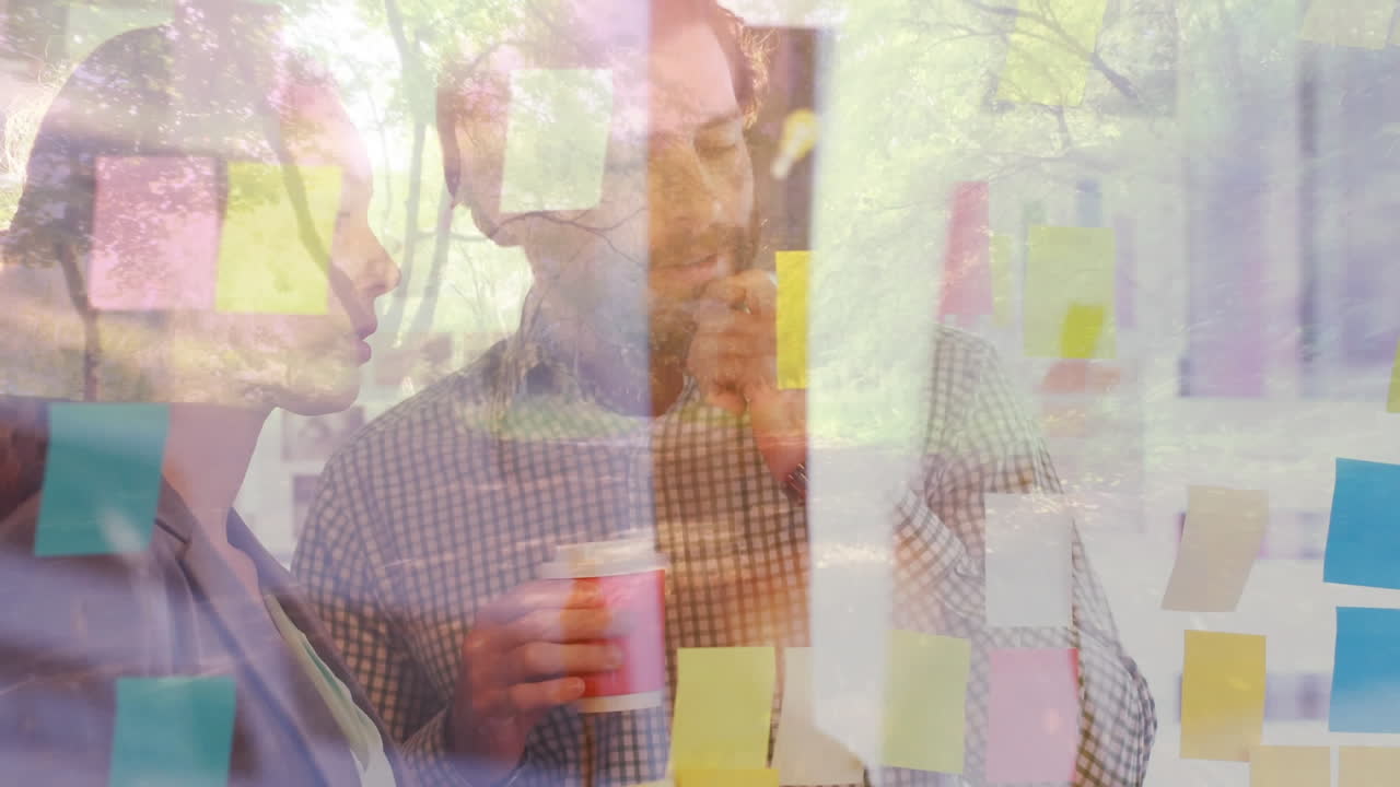 animación de luz brillante sobre hombre y mujer hablando en la oficina con café