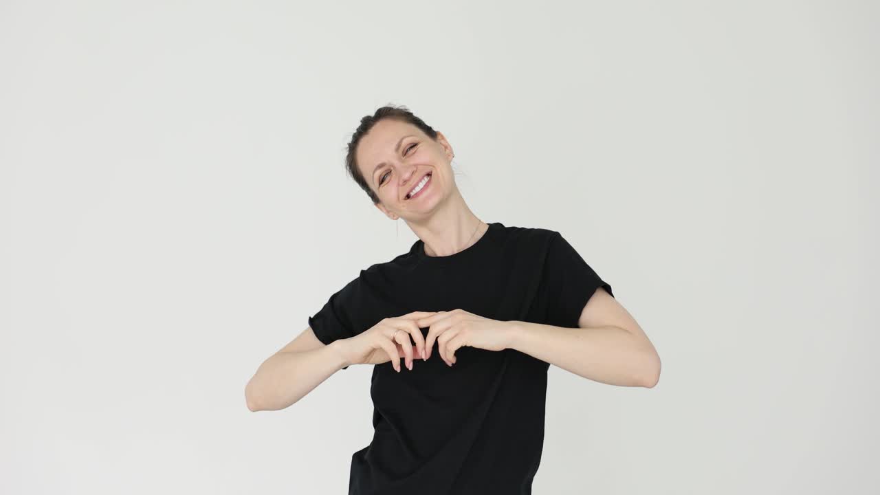 Smiling Woman Expressing Joy and Confidence on White Background