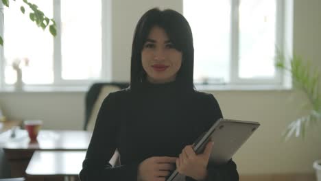 professional woman in a modern office environment, focused on work, dressed elegantly in business attire, surrounded by office equipment and a sleek interior