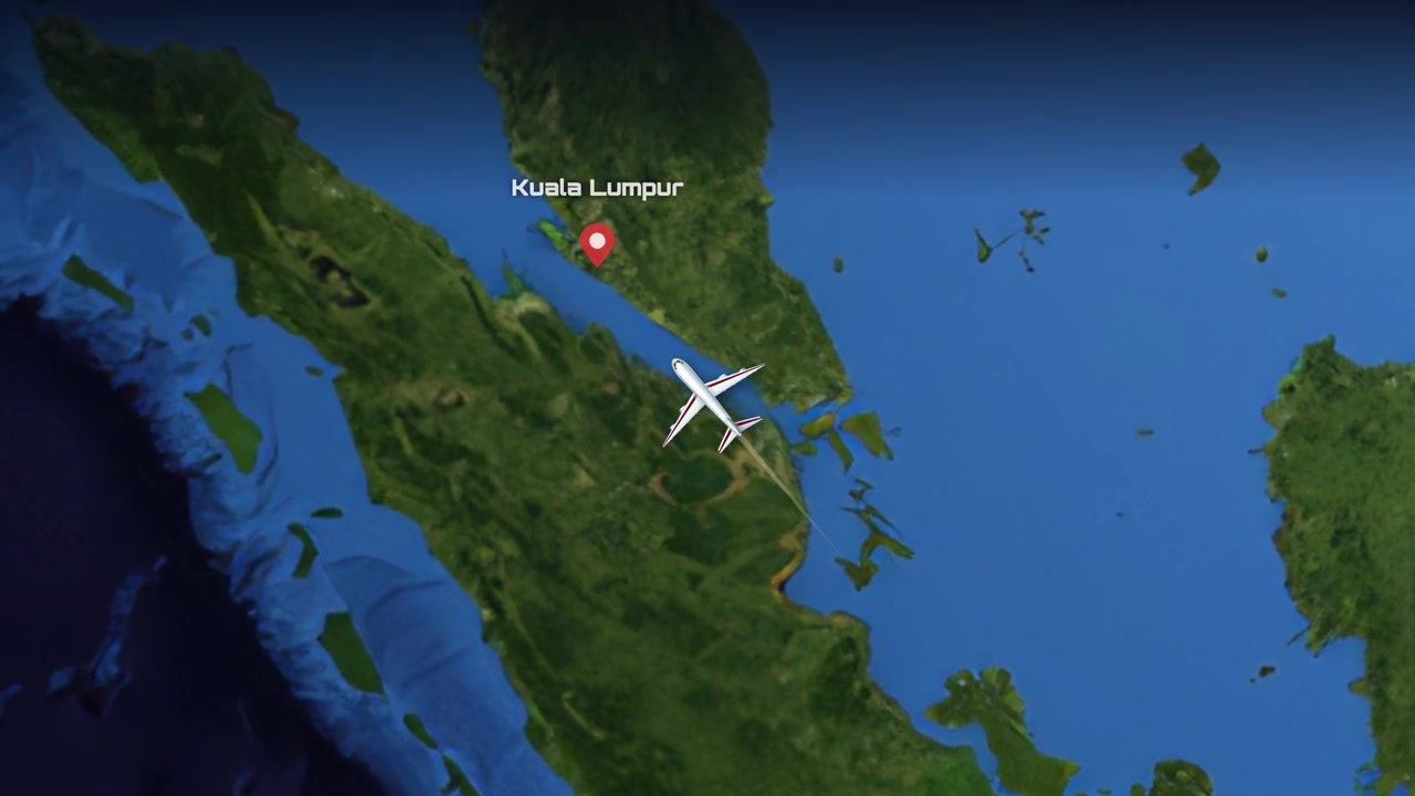 Satellite map animation tracks a commercial airplane flying from Melbourne to Kuala Lumpur across oceans