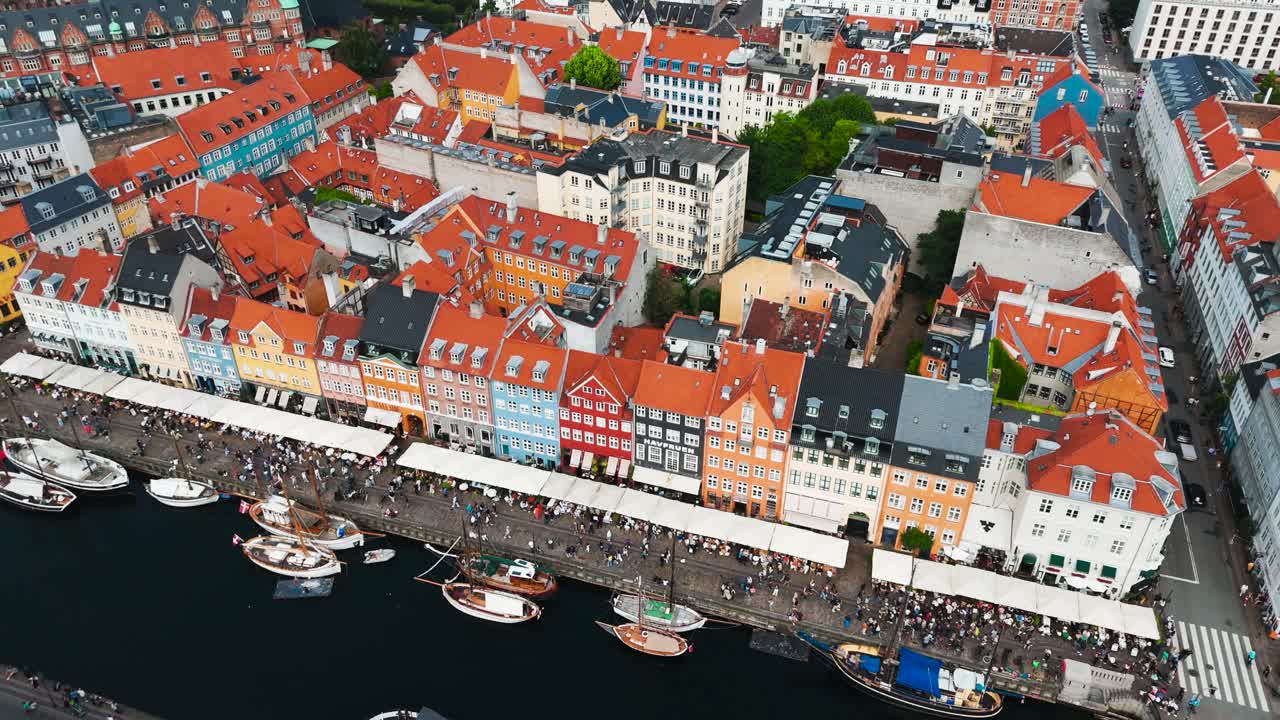 Aerial - colorful waterfront buildings near Nyhavn canal, Copenhagen