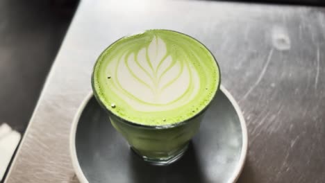 aesthetic hot matcha latte art glass cafe
