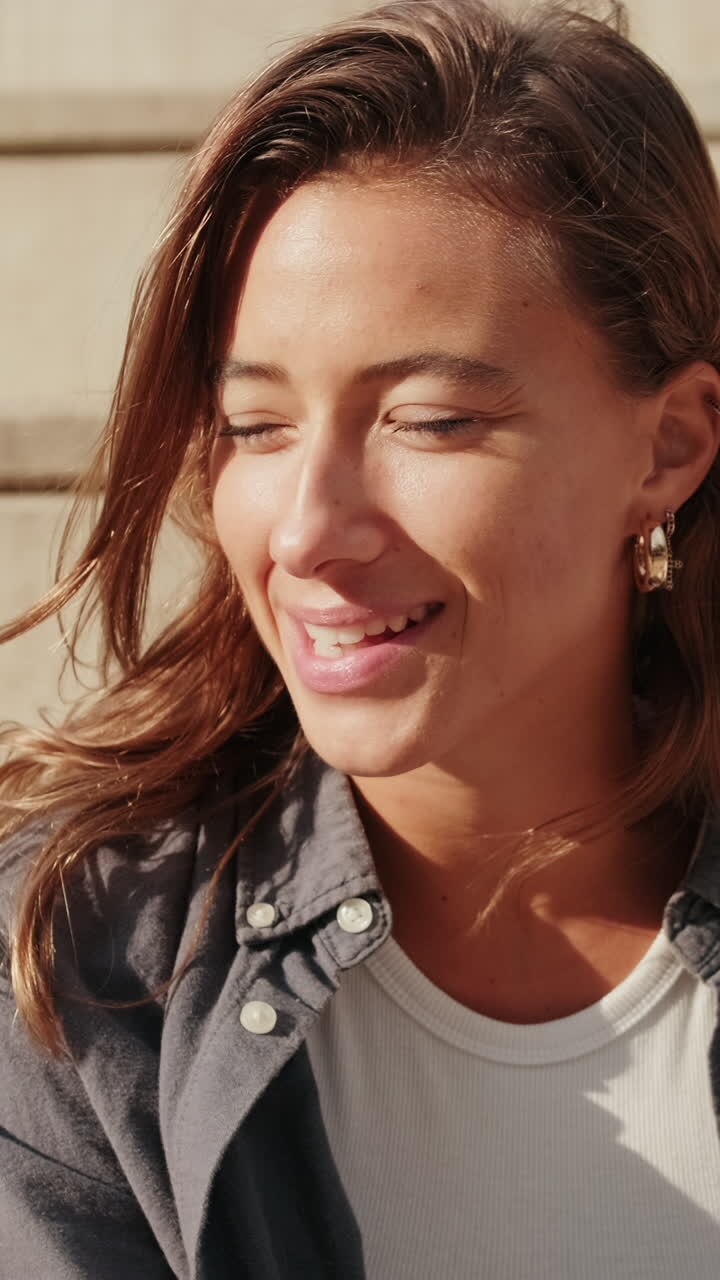 Side view portrait of a carefree student girl talking to friends