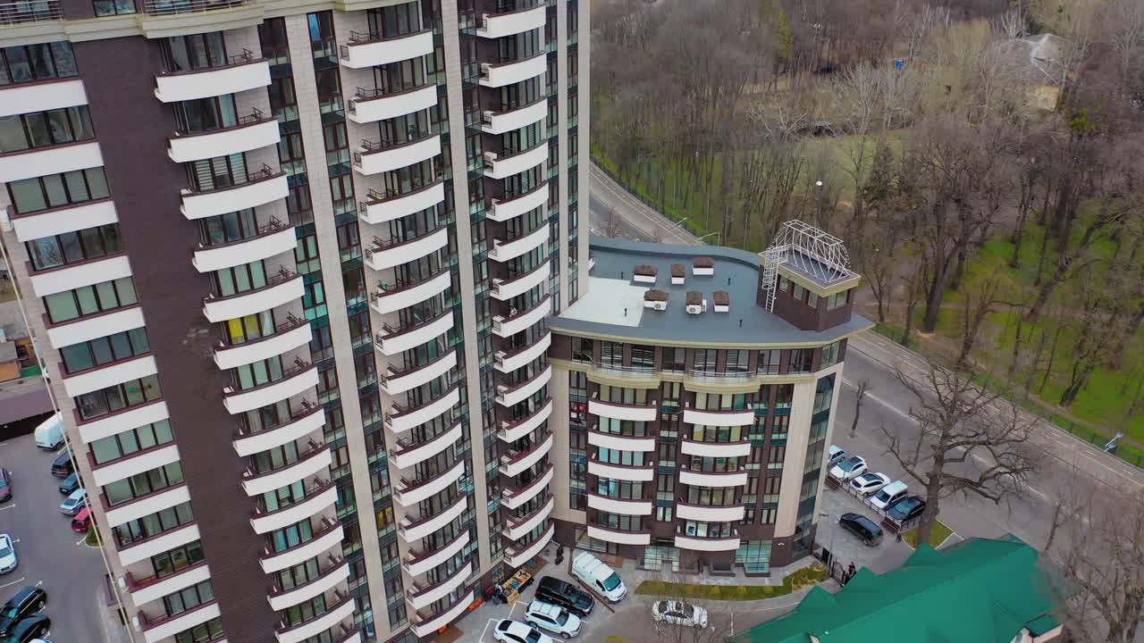Modern residential buildings in city. Fragment of one of the serial high rise apartment buildings