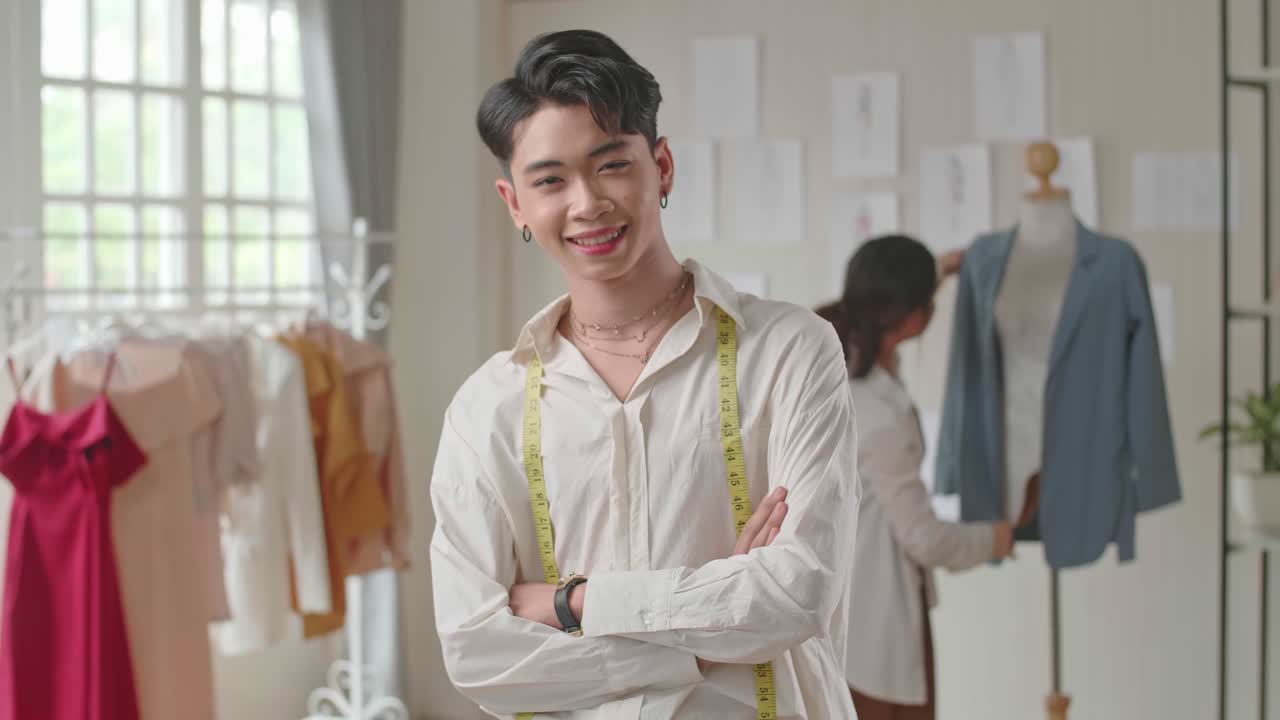 Young Asian Man Dressmaker Smiling