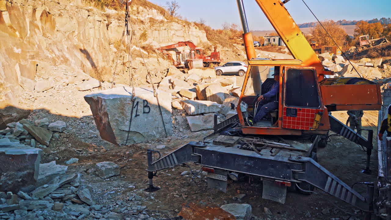 Lifting crane in marble quarry. Modern winch crane used in a stone quarry