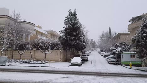 ramp street slip ice frozen city of tehran in middle east in a heavy snowfall in a snowy day in iran tehran city landscape cars driving carefully safety and cold weather climate in caucasus wonderful