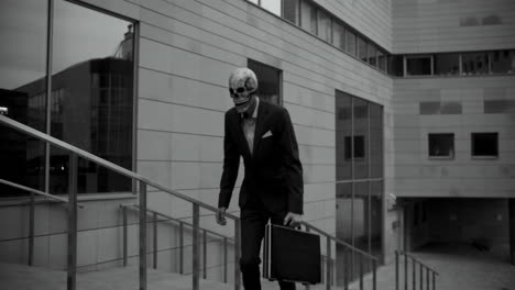 older man walking up stairs in an office building